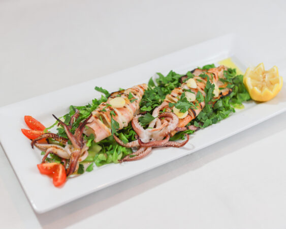 Calamari Fritti - Sliced fresh, flour dusted calamari deep fried to a golden crispy brown